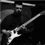 Profesor de guitarra clases particulares con opción a domicilio